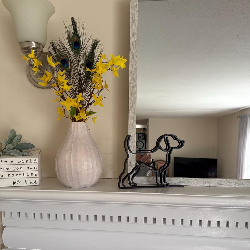 Customer photo of beagle sculpture on a mantle