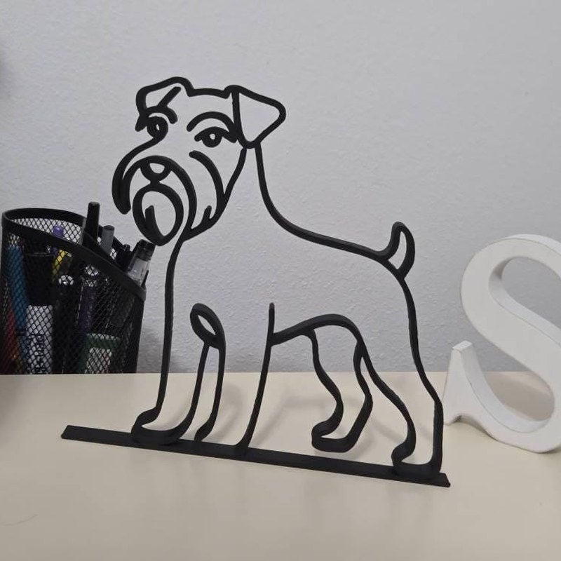 Customer photo of schnauzer sculpture on a desk
